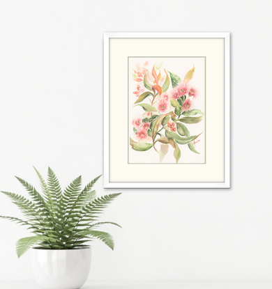 Soft pink gum blossom spray with dancing gum leaves on white background