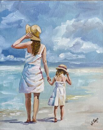 A mother and daughter dressed in white dresses and matching straw hats stroll along the seashore 