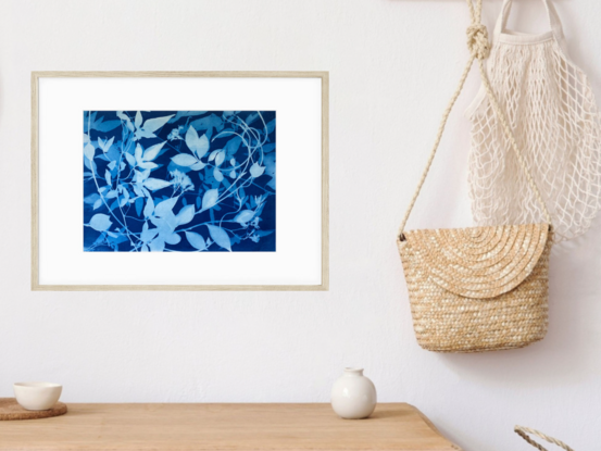 Image of branches of jasmine flowers and leaves in varying shades of blue and white. It is technically a photo but has the texture of a painting.