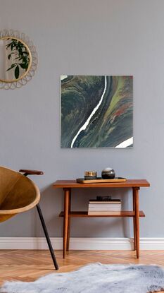 The painting depicts an abstract interpretation of a mountainous landscape as seen from a bird's-eye view. With a river flowing through the center of the canvas,
It was created using the acrylic pouring method with various greens ,sienna and white . this unique technique, allows the acrylic paints to flow and merge organically on the canvas, creating a captivating abstract landscape.