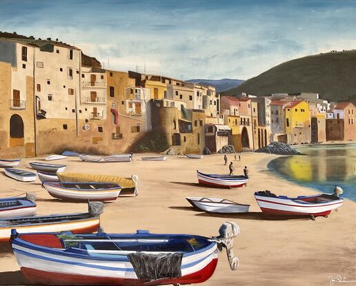 Italy Sicily Cefalù Town beach and boats.