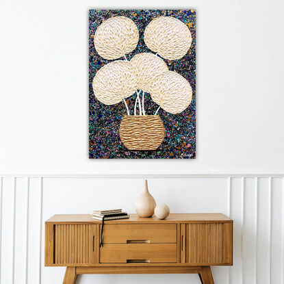 textured cream flowers on a black background
