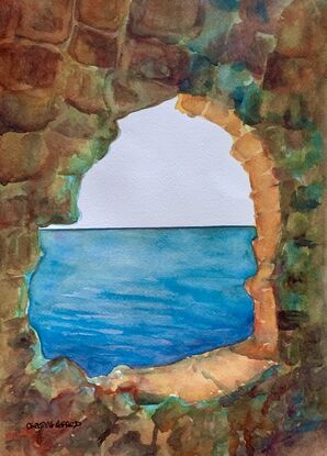 artwork showing an ocean view through the window in a rocky wall 
