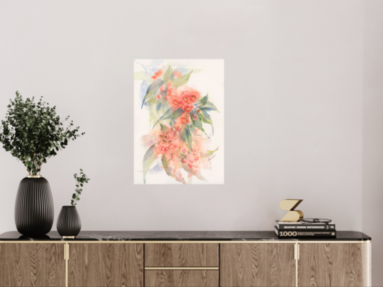 Orange red gum blossom spray with gum leaves on white background