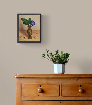 Flower in gold patterned vase, three shells at the base