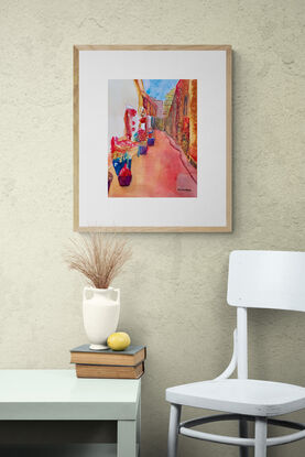 artwork showing a mediterranean narrow street drenched in sunlight