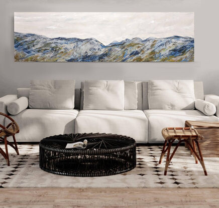 A large mountain artwork showing autumn trees painted in shades of green, grey, ochre, yellow, blues and white with texture