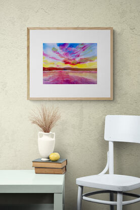 artwork showing a vast expanse of sky made colourful by the setting sun