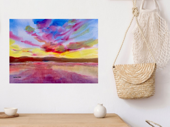 artwork showing a vast expanse of sky made colourful by the setting sun