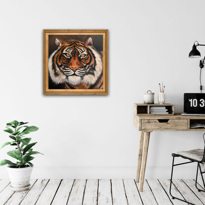 Painted in rich hues this artwork captures the intense gaze of a tiger. This artwork is  unframed 