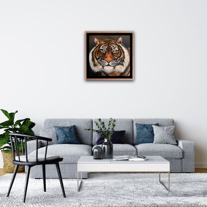 Painted in rich hues this artwork captures the intense gaze of a tiger. This artwork is  unframed 