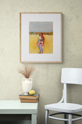 artwork showing a woman standing on a beach with grassy topped dunes in the distance