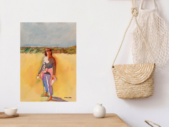 artwork showing a woman standing on a beach with grassy topped dunes in the distance