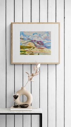 artwork showing a landscape view of the Lake District in Cumbria, England with the fells in the distance