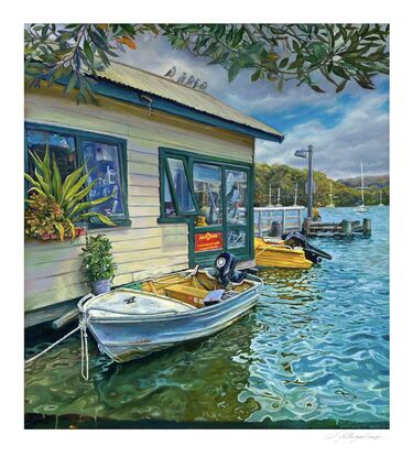 Small boat tied up next to wharf and old boatshed in high tide with seagulls, distant land and cloudy sky in Sydney's Northern Beaches