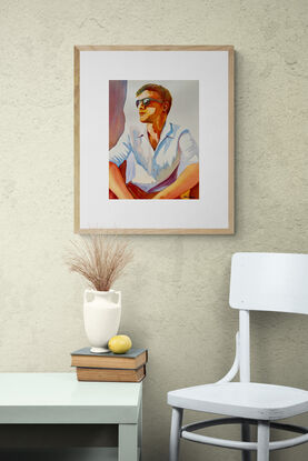 artwork showing a man wearing sunglasses looking off into the sun