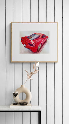 artwork showing a red Ferrari

