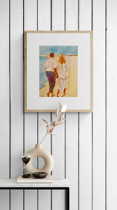 artwork showing a couple walking on the beach

