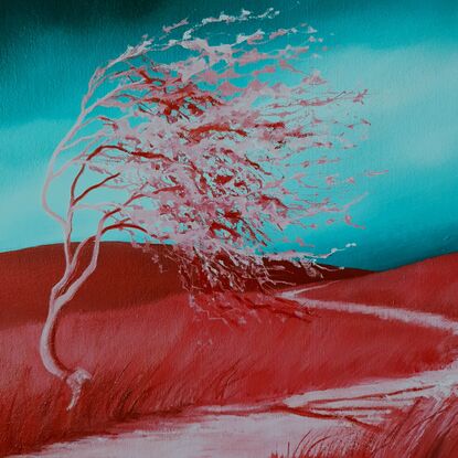 Australian landcape with vibrant grren windswept sky and red/pink hills and tree in the foreground, framed