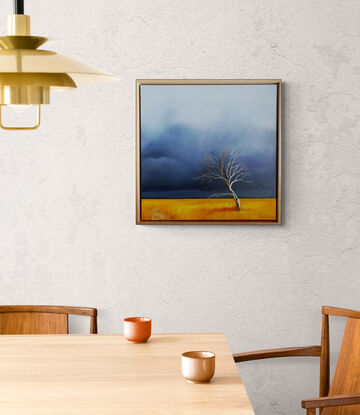 Australian landcape with vibrant gold grasses and a deep blue sky plus a tree and a small path