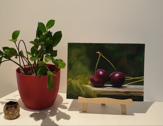 Cherries on the wooden bench 