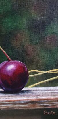 Cherries on the wooden bench 