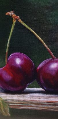 Cherries on the wooden bench 