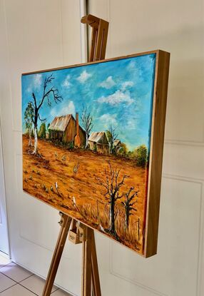 This acrylic framed painting features the rich ochre colours, and clear blue skies of the harsh Australian summer, only a few Emus and Cockatoos remain to survive  the sunburnt land