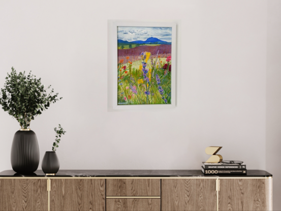 The focal point of the painting is a lavender stem on top of which a bee sits. This is surrounded by more lavender and other flowers which appear to grow in a lush wildflower arrangement. In the background is first a patch of light grass, then two lavender fields. The colours grow darker as they recede. Behind the fields are more grassy hills spotted with trees, and finally some blue mountains deep in the distance. A cloudy sky sits above it all.