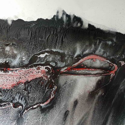 a large abstract of lava and black rock in Iceland. Molten magma. Black, white, red and silver