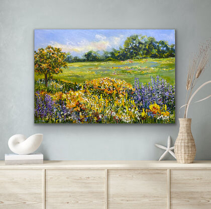 Splashes of red, orange and yellow flowers in the background between the summery sky and gentle mountain peaks. There are a profusion of flowers of all colours in the foreground. Including purple mauve light blue.  A summer field of flowers  that is relaxing  to immerse yourself in its calm and restful feeling. This is a happy piece and will be a soothing beautiful addition to your home. 