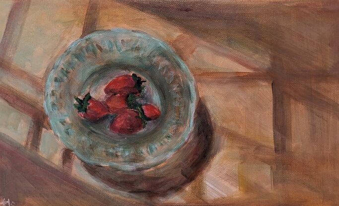 strawberries in glass bowl