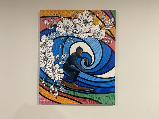 Acrylic painting colourful background and person surfing on large glue waves designed with black and white flowers and using paint markers creating intricate patterns and bold black outlines