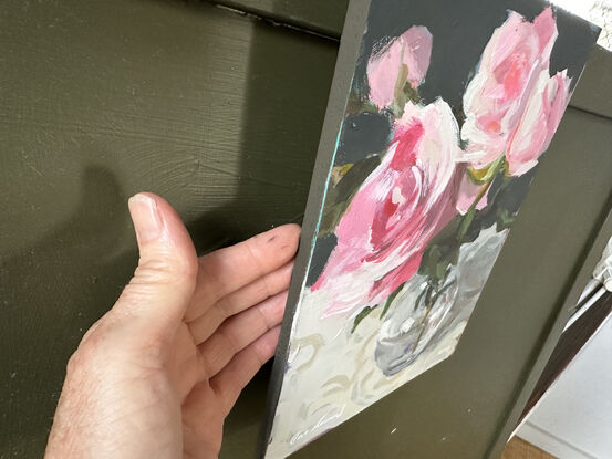 An original, expressive painting of a vase of pink roses, with visible brush work, ready to hang with chord fastened to the back.