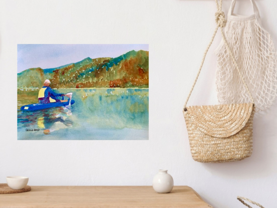 artwork image of a man canoeing on a lake