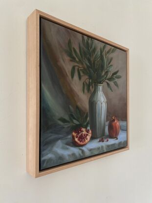 Still life with  Pomegranate and a vase 