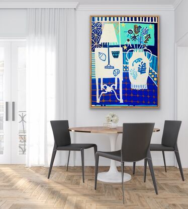 White table, vase and lamp sit against a blue tiled floor and window background.