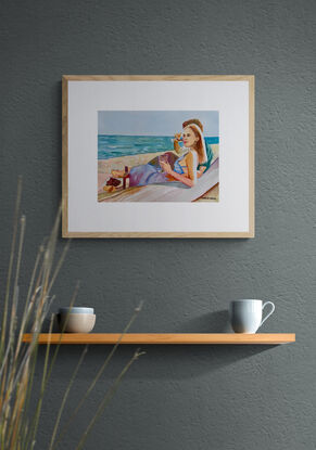 artwork which is the image of a couple sitting sipping red wine on the beach