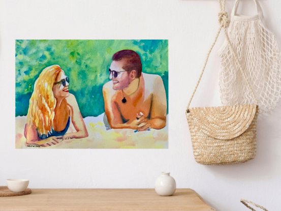 artwork which is the image of a couple lying on the beach next to each other and laughing 