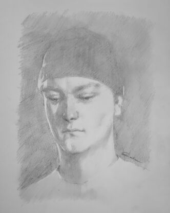 portrait of young man wearing beanie