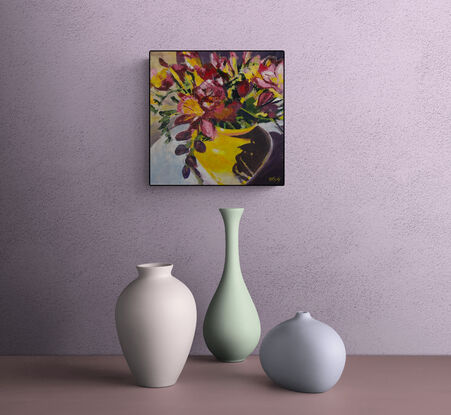 A yellow vase filled with warm tones of yellows and reds on a small square canvas.