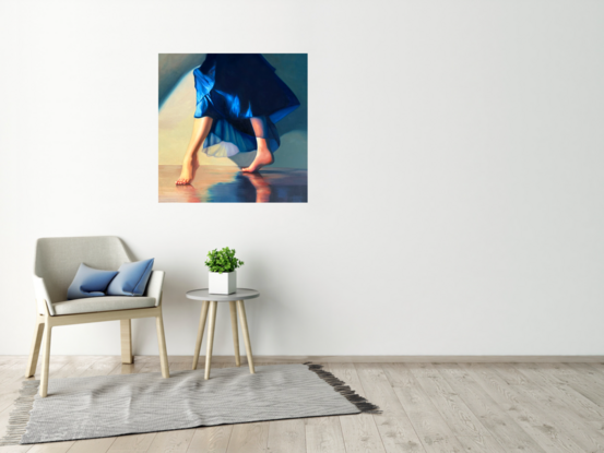 woman in a blue dress dancing barefoot