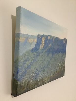 Wall art mountain shadows trees valley