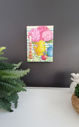 Pink flowers in yellow vase