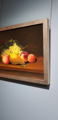 Luscious fruit and yellow grapes on tabletop