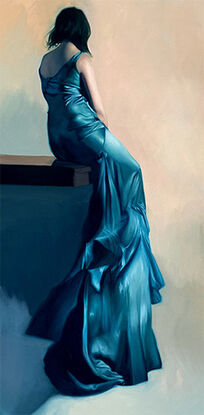 woman sitting on a wall in a long teal dress