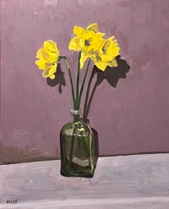 This is a painting of three daffodils in a crystal vase against a purplish background and on a white cloth