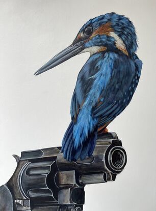 Photo realistic kingfisher bird and revolver on  white background 