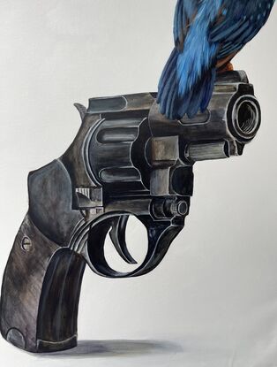 Photo realistic kingfisher bird and revolver on  white background 