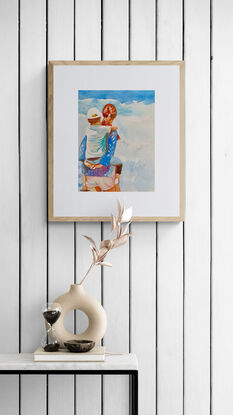 artwork which shows a mother giving her son a piggy back whilst looking out at the ocean